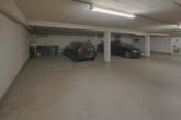 Wunderschöne Dachgeschosswohnung mit sonnigem Balkon und eigenem Tiefgaragenstellplatz - Tiefgaragenstellplatz