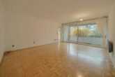 Schöne Hochparterre Wohnung mit Garten im Westender Weg - Wohnzimmer